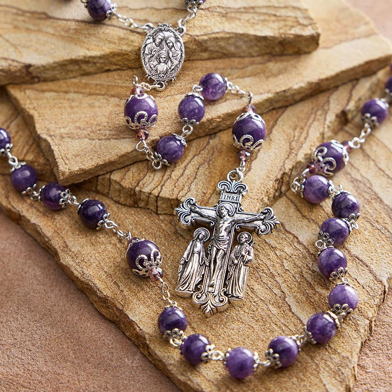 Holy Family Amethyst Rosary showing Pray Together as a Family centerpiece and crucifix