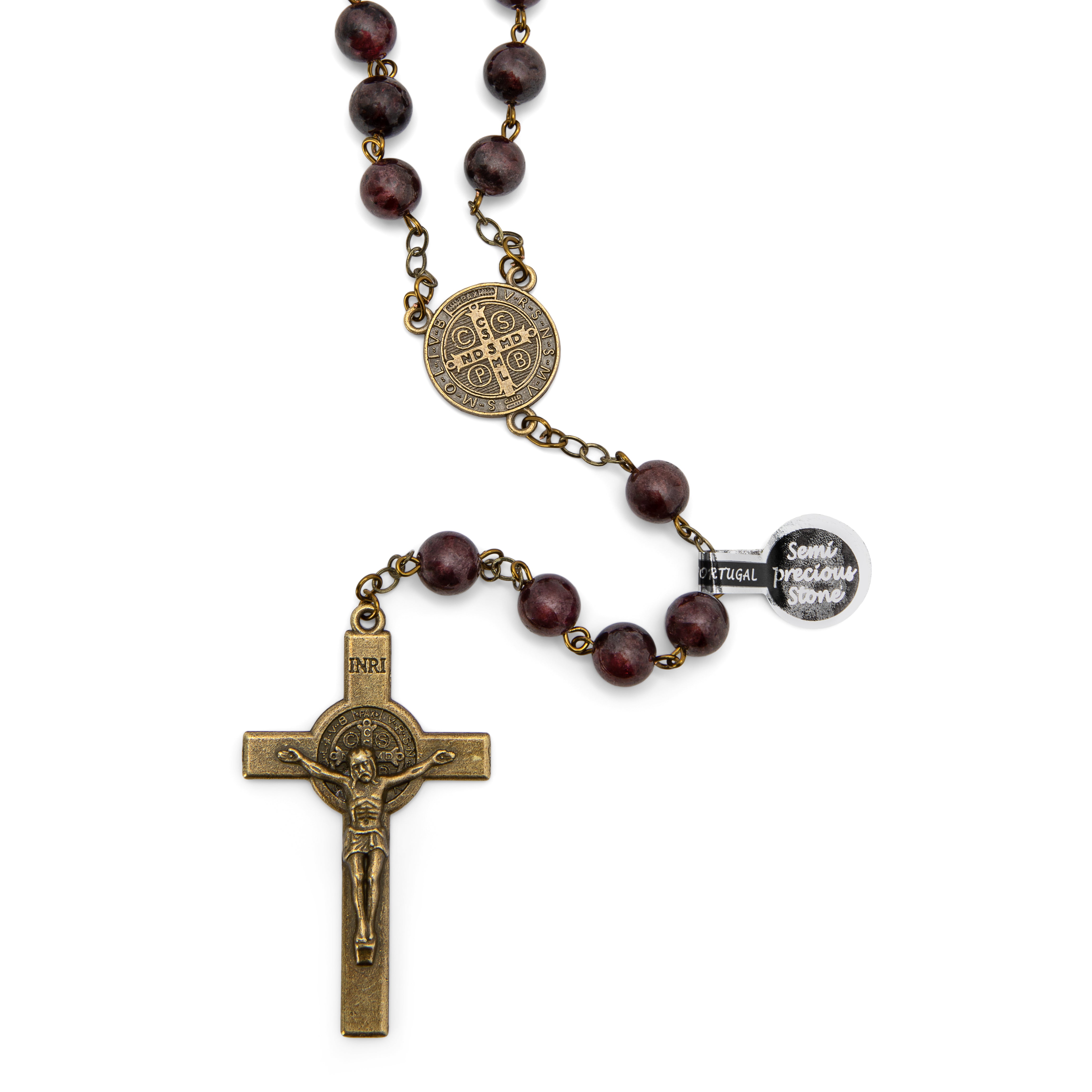 Rosary with brown beads and gold cross on a white background